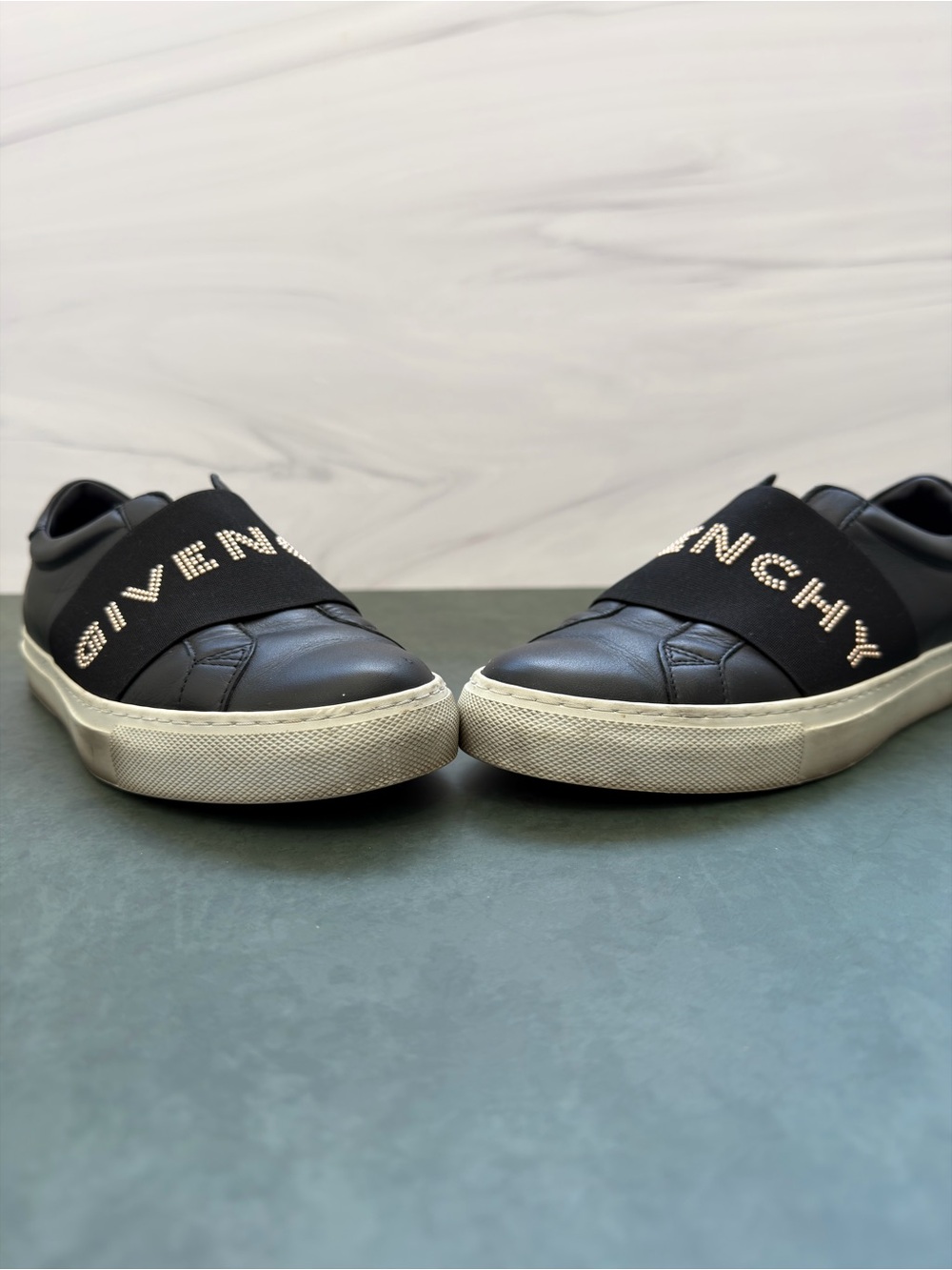Givenchy Black Leather Slip-On Sneakers with Embellished Logo Strap